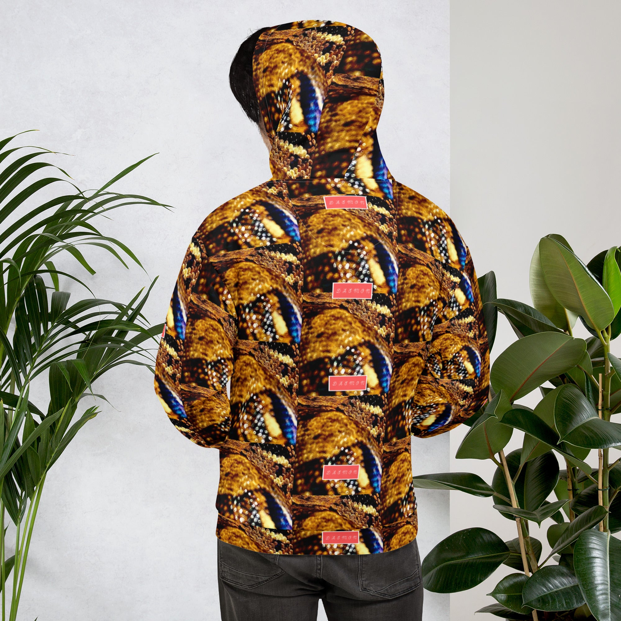 Recycled white unisex hoodie with all-over serpentine Nicaragua print and hood, by Daemon Luxury.