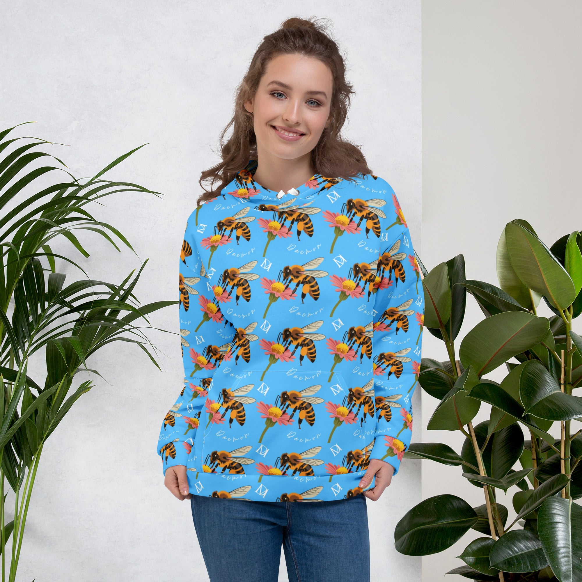 Daemon Luxury Honeybee Shores Pacifika Fever unisex hoodie with all-over printed recycled fabric and white front design.