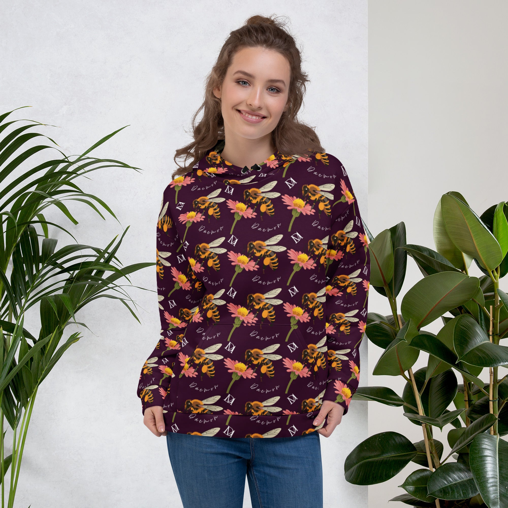 Unisex white hoodie with all-over honeybee shores dusk print from Daemon Luxury, featuring a hood and front design.