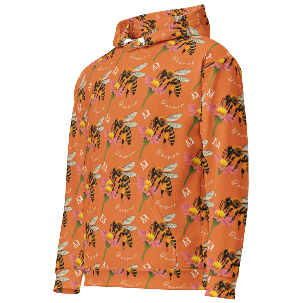 Unisex white hoodie with all-over honeybee shores golden hour print by Daemon Luxury, featuring a front pocket and hood.