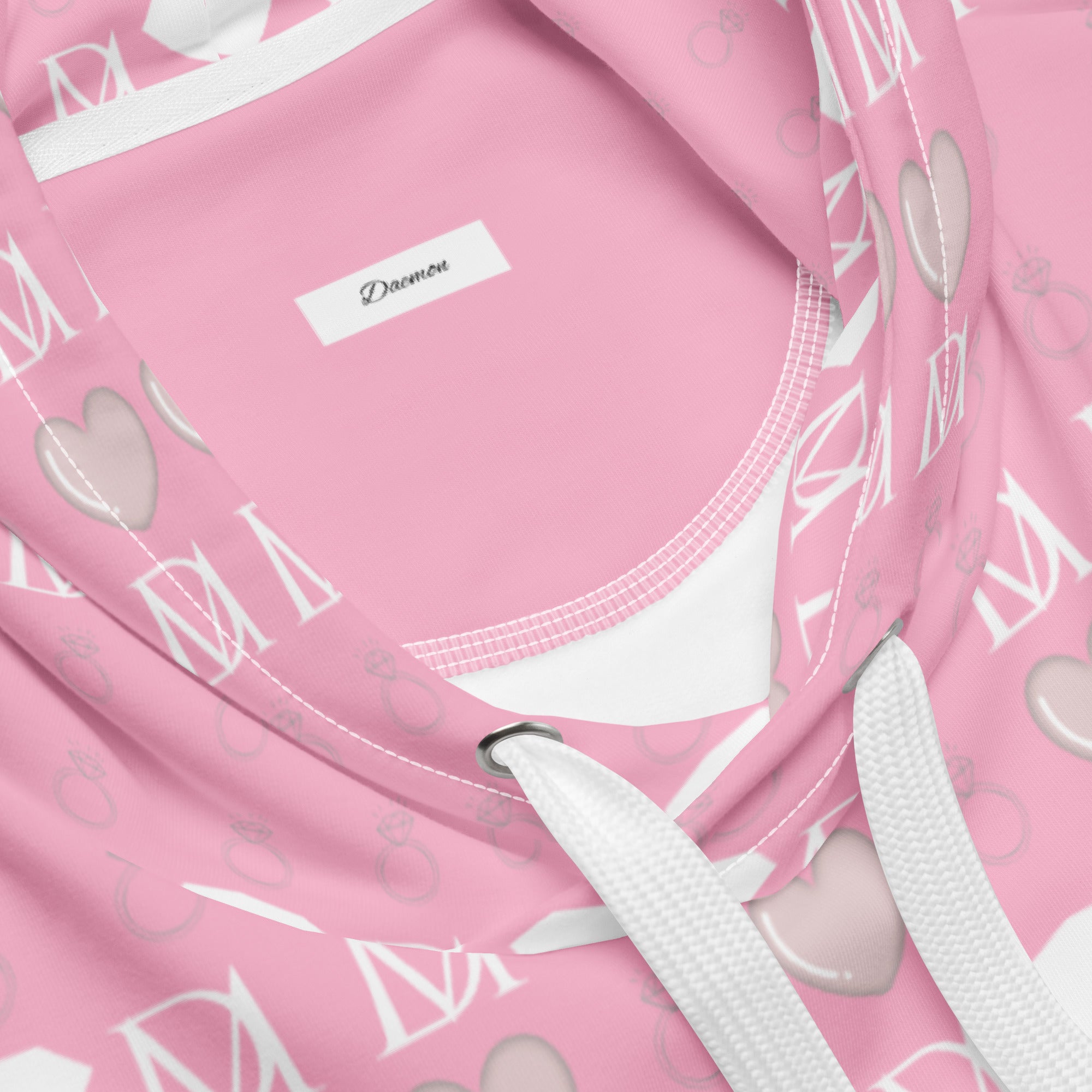 Unisex white hoodie with all-over frosted diamond and cotton candy cinzel print by Daemon, featuring a front pocket and drawstring hood.