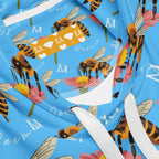 Unisex white hoodie with all-over print of Honeybee Shores Pacifica Fever design by Daemon Luxury, featuring a cozy hood and casual style.