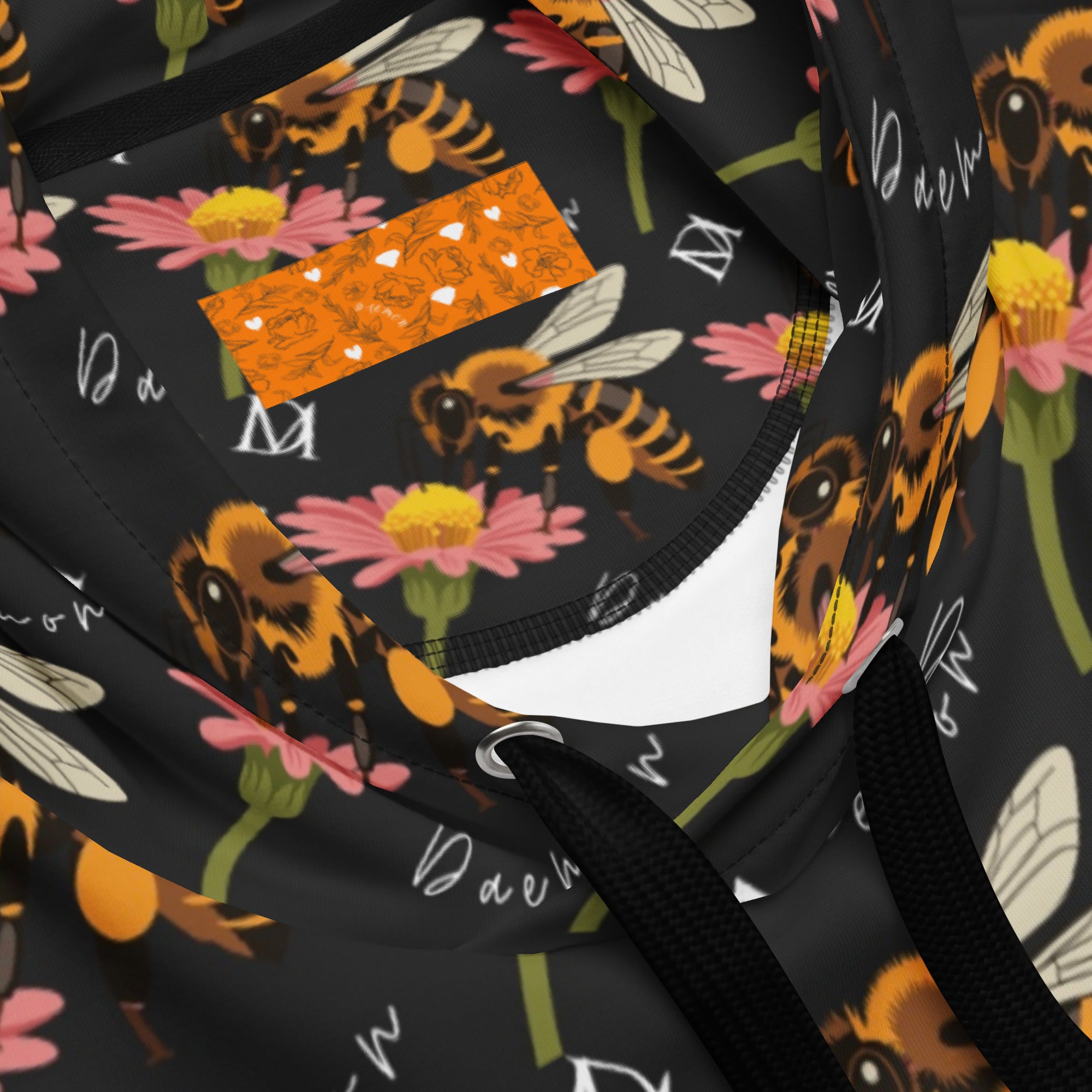 Unisex white hoodie with all-over honeybee shores print by Daemon Luxury, featuring a cozy hood and recycled fabric design.