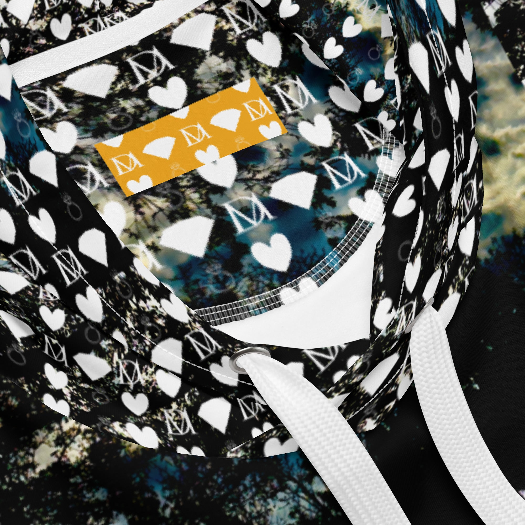 Unisex white hoodie with stitched frames design from Daemon Luxury's Panther Canyon collection, featuring all-over recycled print.