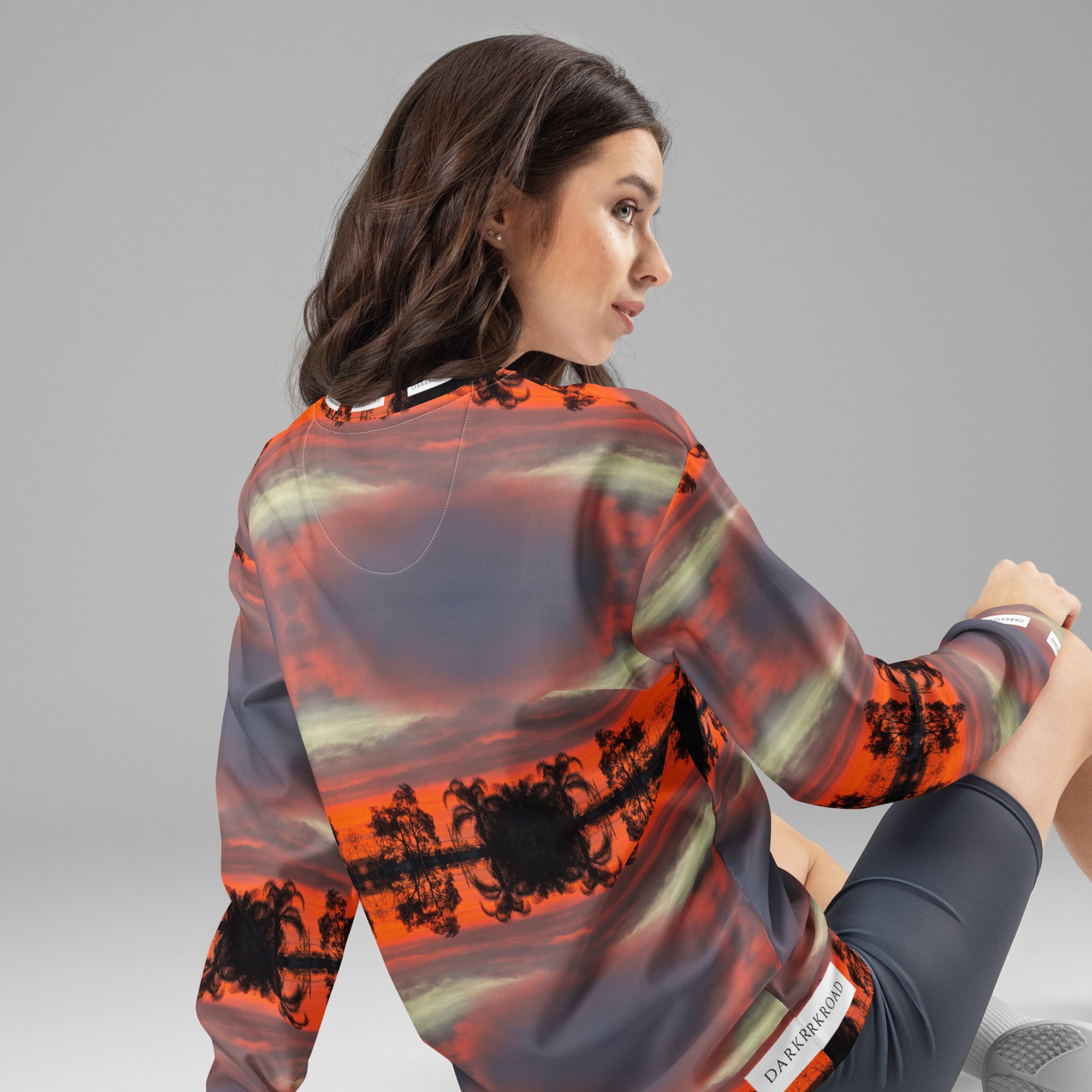 Darkroad Hellbreak recycled unisex sweatshirt by Daemon Luxury with all-over white print, showing the back view.