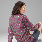 All-over-print recycled white unisex sweatshirt by Daemon Luxury, showing the back view with vibrant design details.