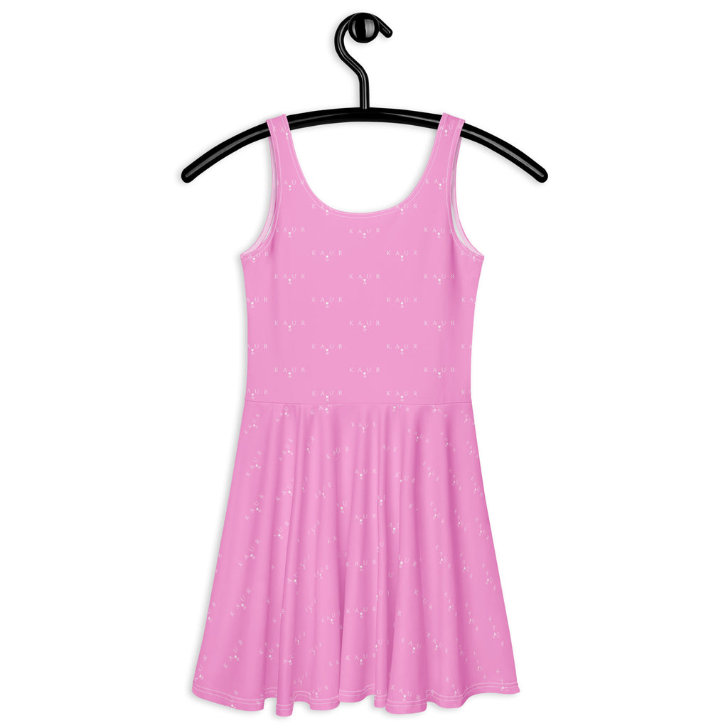 White Bubblegum KAUR skater dress by Daemon Luxury with colorful all-over print, back view of the stylish, trendy dress.