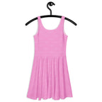 White Bubblegum KAUR skater dress by Daemon Luxury with colorful all-over print, back view of the stylish, trendy dress.