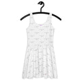 White skater dress by Daemon Luxury featuring speckled diamond Artica print, shown from the front.