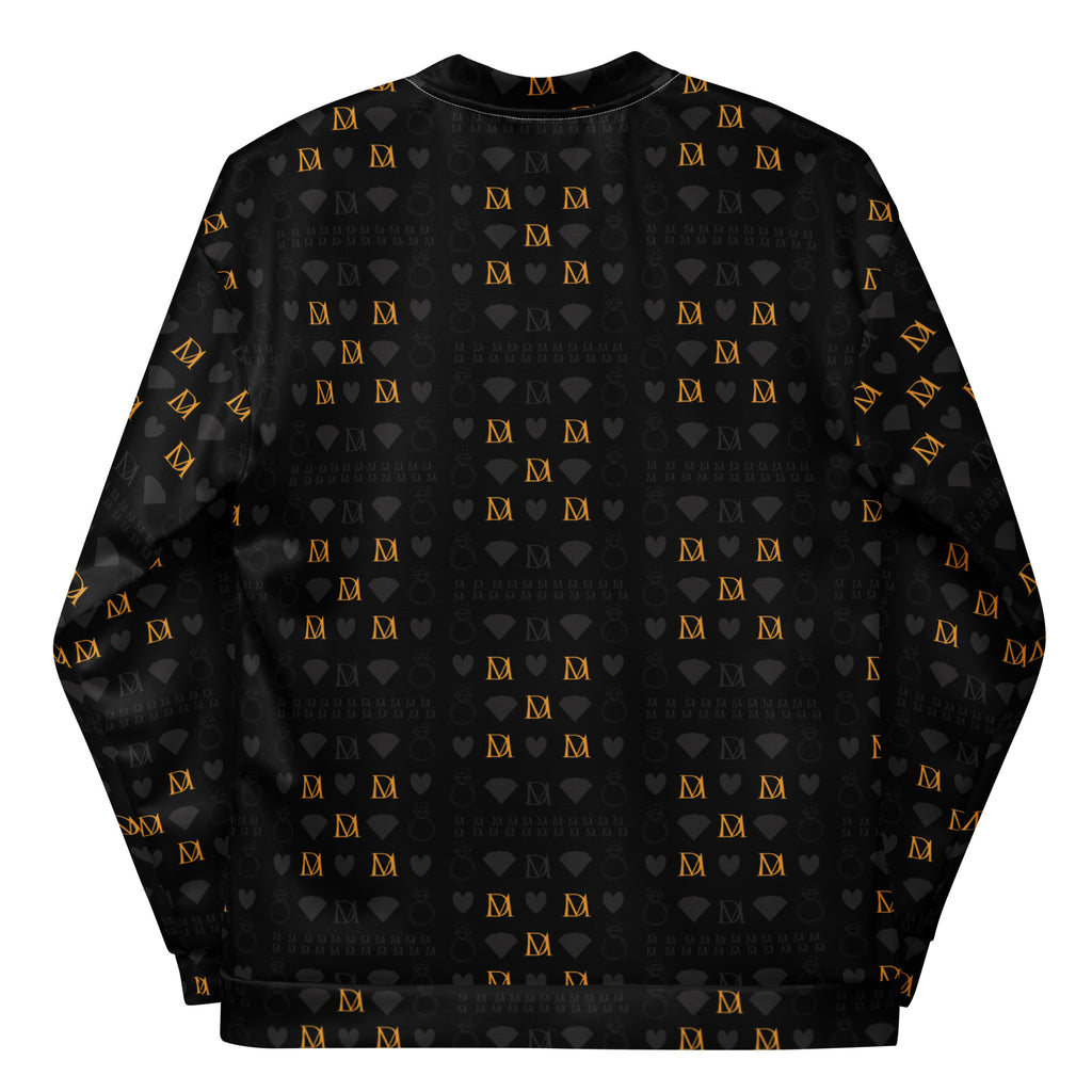 Unisex bomber jacket by Daemon Luxury with all-over frosted diamond print in gold on a white background.