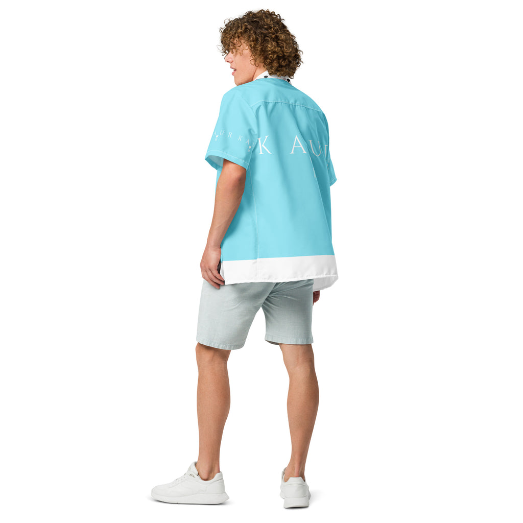 Unisex Bubblegum Skies Tainu Yaad Camicia button-up shirt with all-over pink and blue sky print on white fabric, casual and stylish.