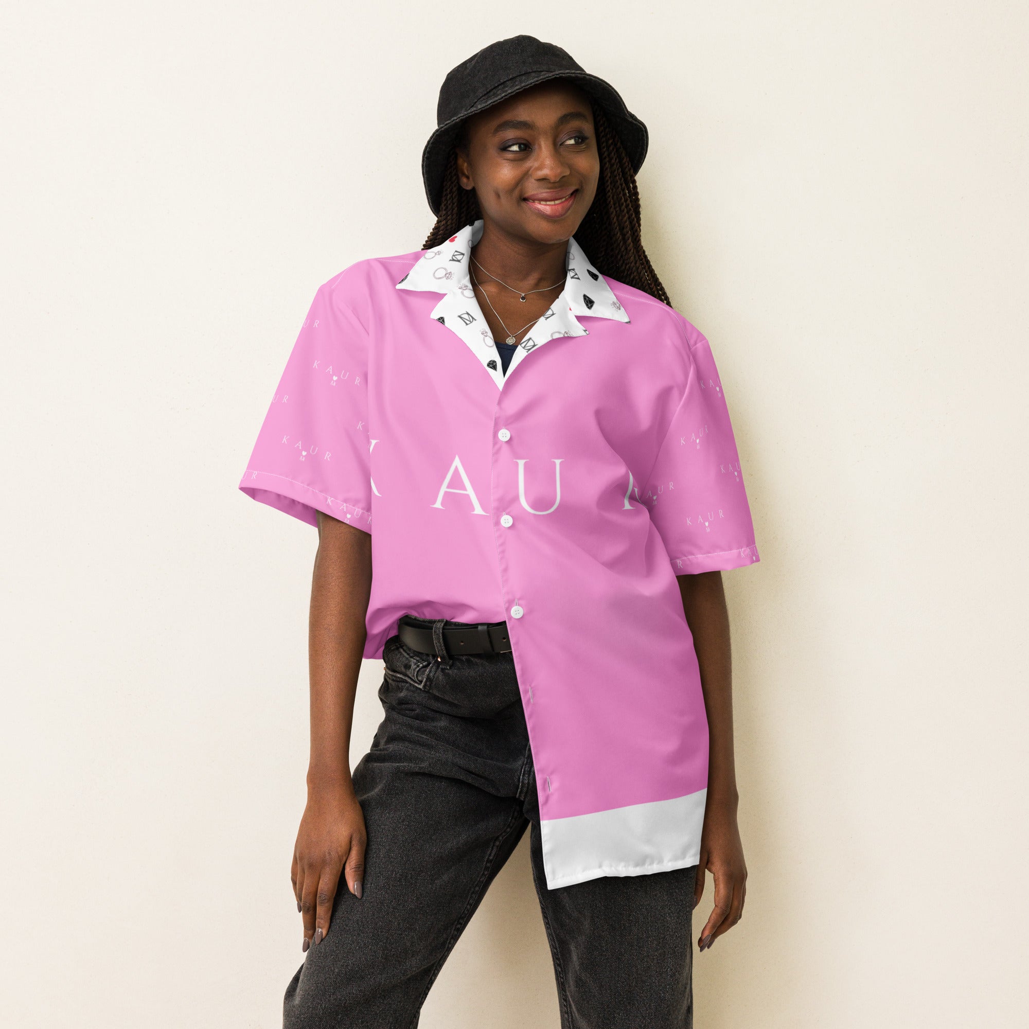 Unisex white button-up shirt featuring all-over cotton candy love (Tainu Yaad) print by Daemon Luxury, front view.
