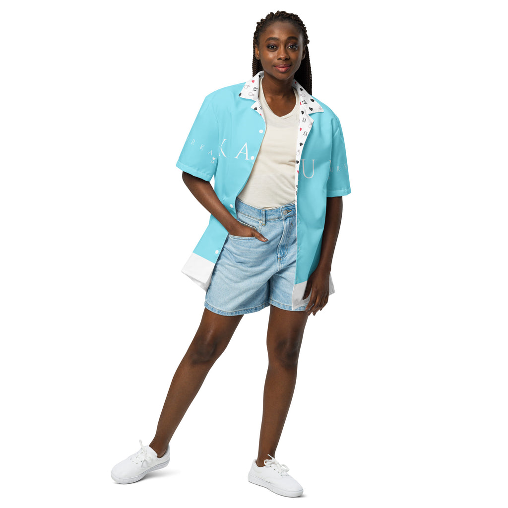 Unisex Bubblegum Skies Tainu Yaad camicia shirt with all-over colorful print, front view, casual button-up design by Daemon Luxury.