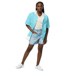 Unisex Bubblegum Skies Tainu Yaad camicia shirt with all-over colorful print, front view, casual button-up design by Daemon Luxury.