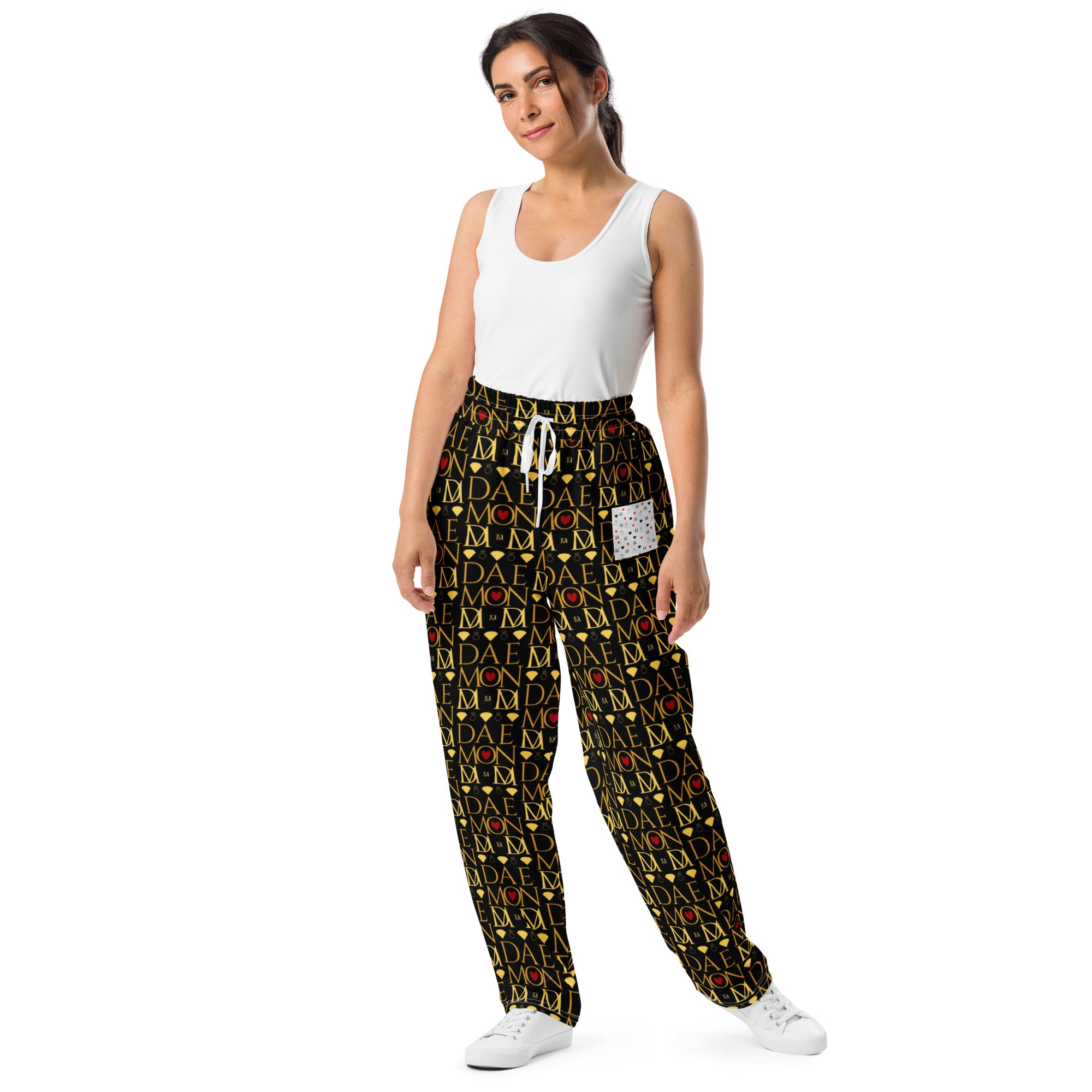 All-over print white unisex wide-leg joggers from Sun Glow California by Daemon Luxury, featuring a stylish front view.