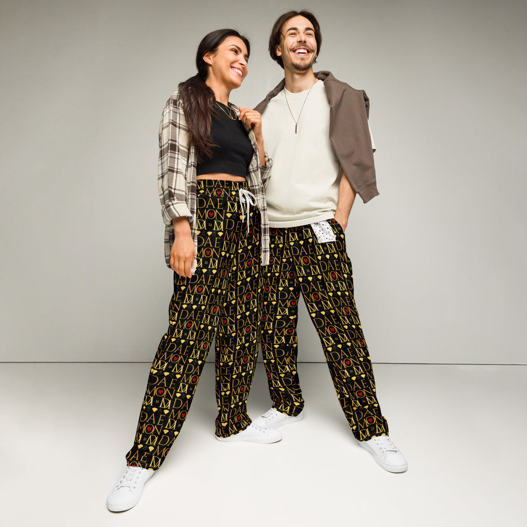Unisex white wide-leg joggers with all-over Sun Glow California print by Daemon Luxury, front view.