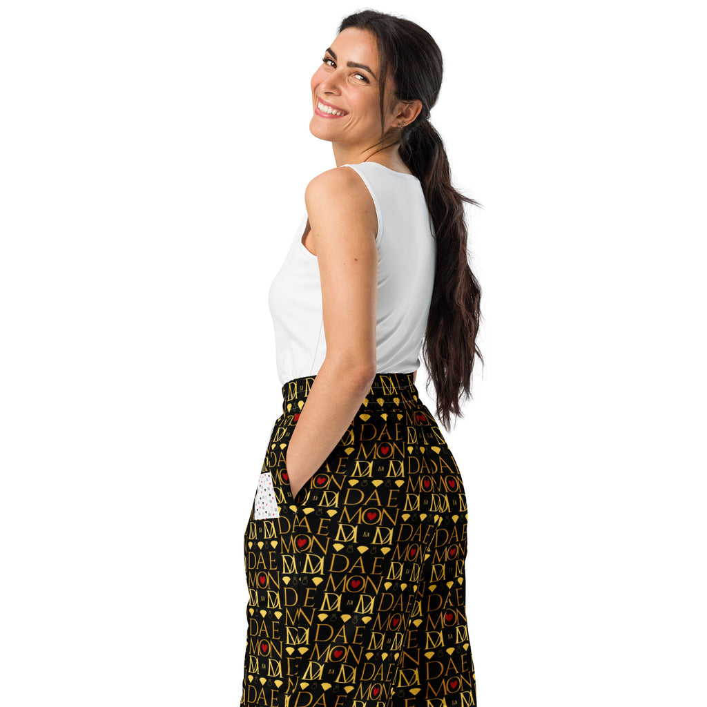 Unisex white wide-leg joggers with Sun Glow California all-over print from Daemon Luxury, shown from the back left side.