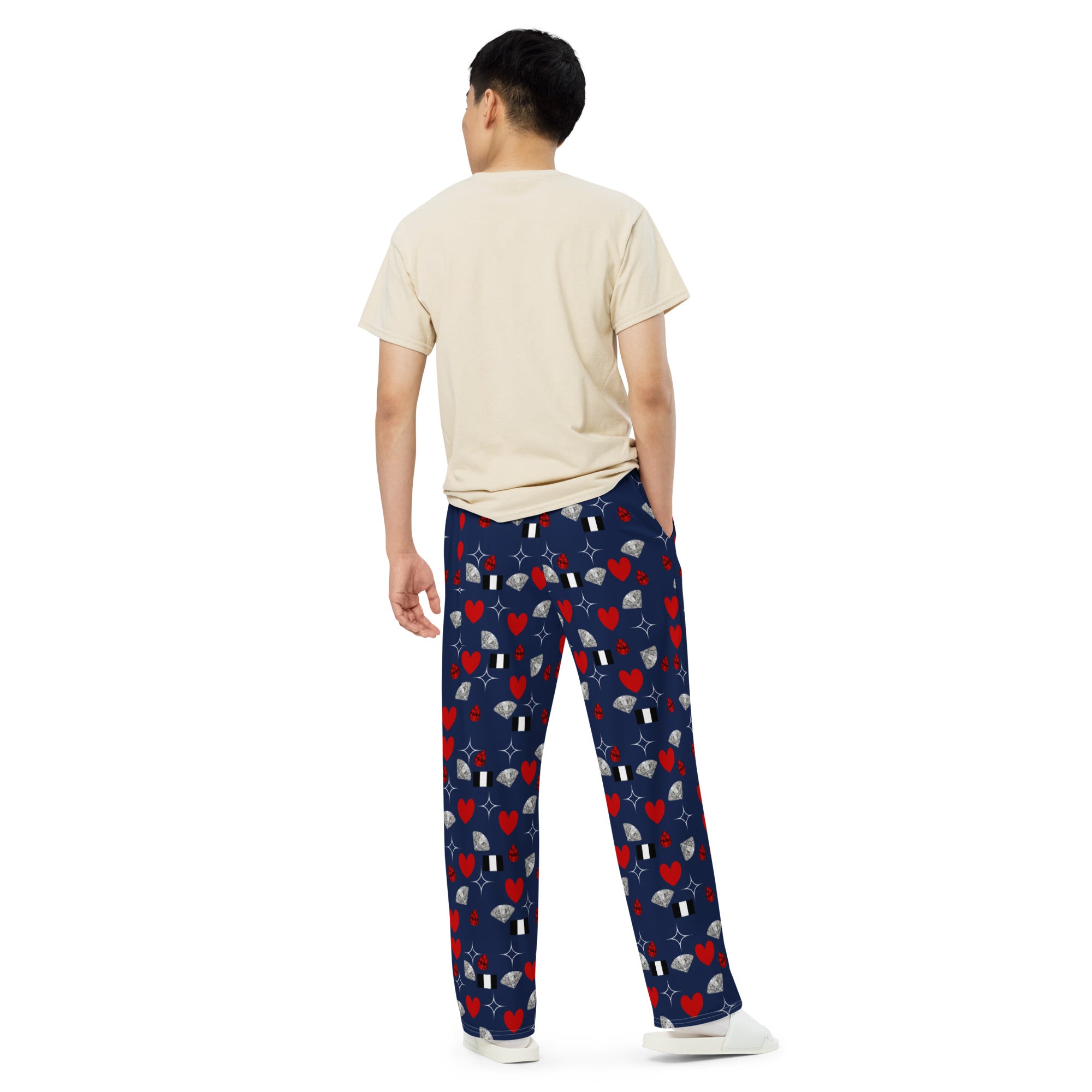 Daemon Luxury Foreigners Luv upscale unisex wide-leg pants with all-over print, white fabric, and relaxed fit for stylish comfort.