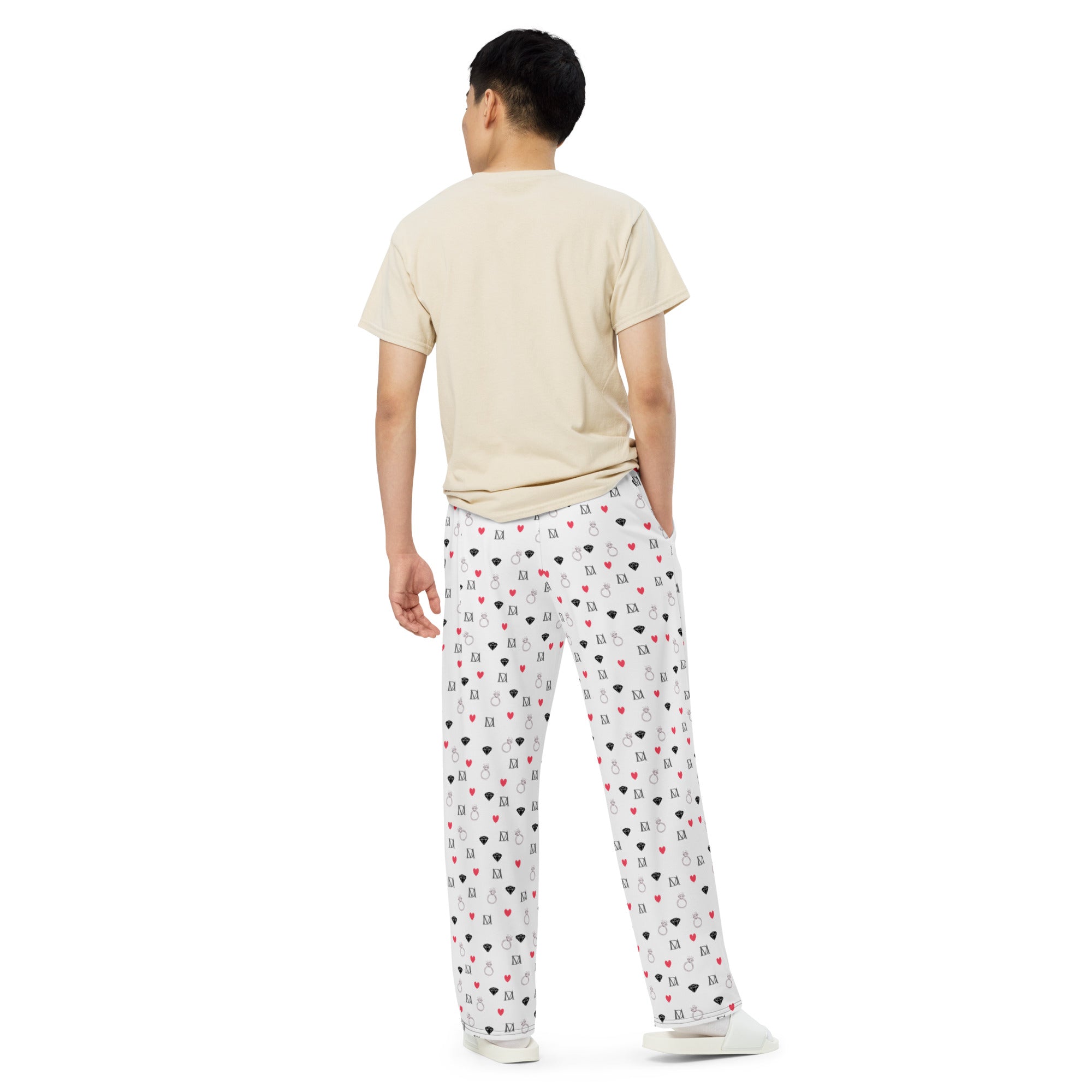 Unisex wide-leg pants by Daemon Luxury featuring speckled diamond Artica Blizzard print on white fabric.