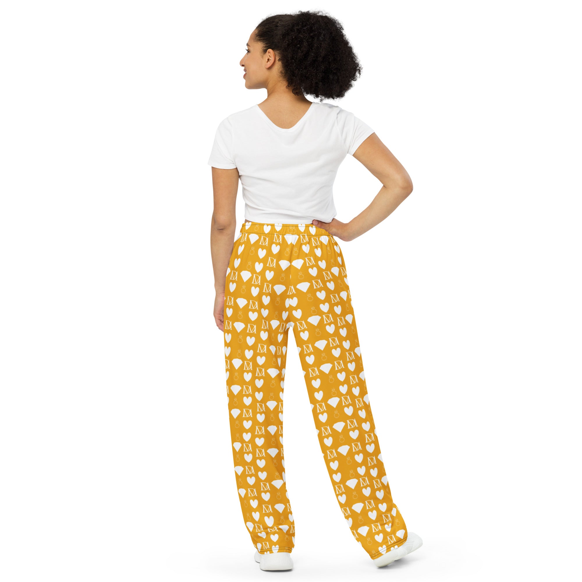 Daemon Luxury Tarmin Honeybees unisex wide-leg sala pants with all-over honeybee print on white fabric.