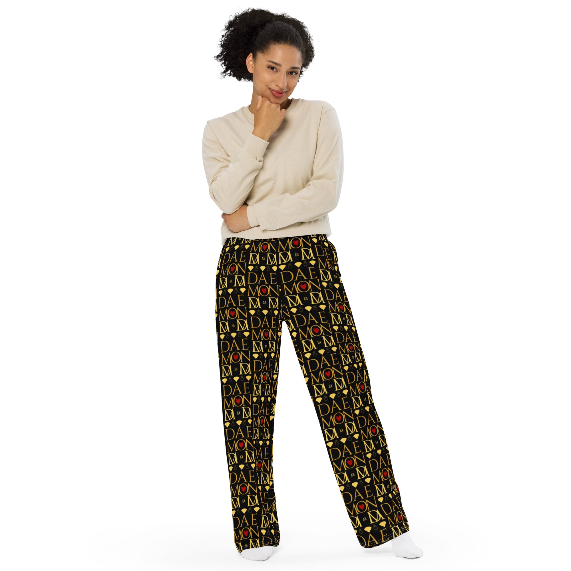 White all-over print unisex wide-leg pants from Daemon Luxury's Sun Glow California .1 Lounge collection.
