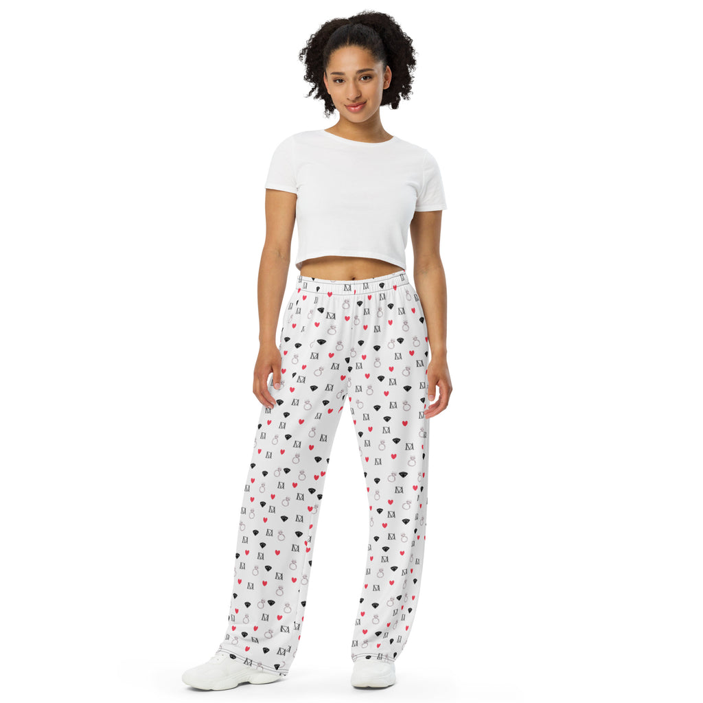 Unisex wide-leg pants with speckled diamond pattern in white by Daemon Luxury, featuring an all-over-print design.