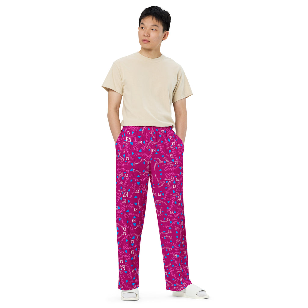 Unisex wide-leg pants by Daemon Luxury featuring all-over magenta Picasso mirror print on white fabric.