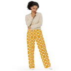 Daemon Luxury Tarmin Honeybees unisex wide-leg sala pants with all-over honeybee print on white fabric.