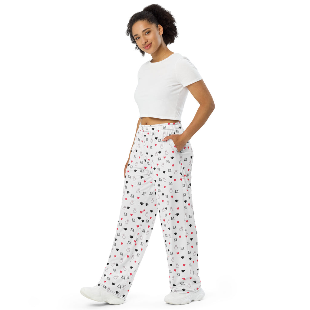 Unisex wide-leg pants with speckled diamond Artica Blizzard print by Daemon Luxury, showing front view with all-over white pattern.