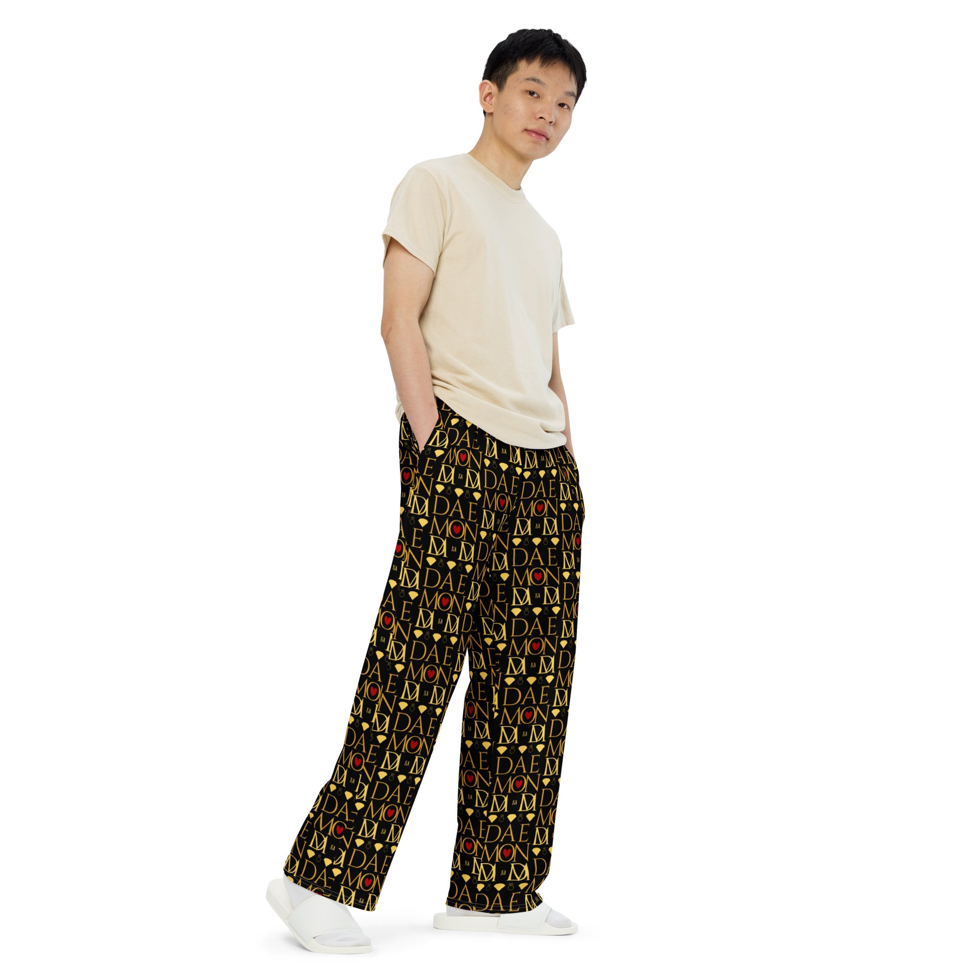 Unisex wide-leg pants with Sun Glow California all-over print by Daemon Luxury, shown from the front in white.