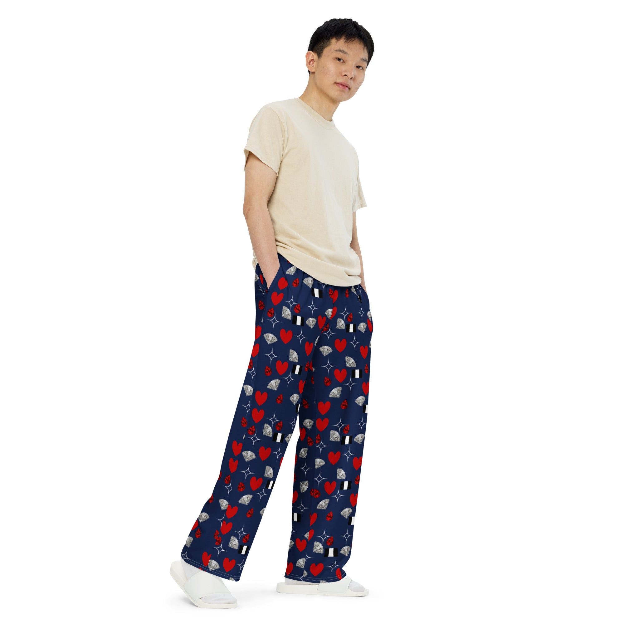 Unisex wide-leg pants with all-over print in white by Daemon Luxury from the Foreigners Luv Upscale collection, front view.