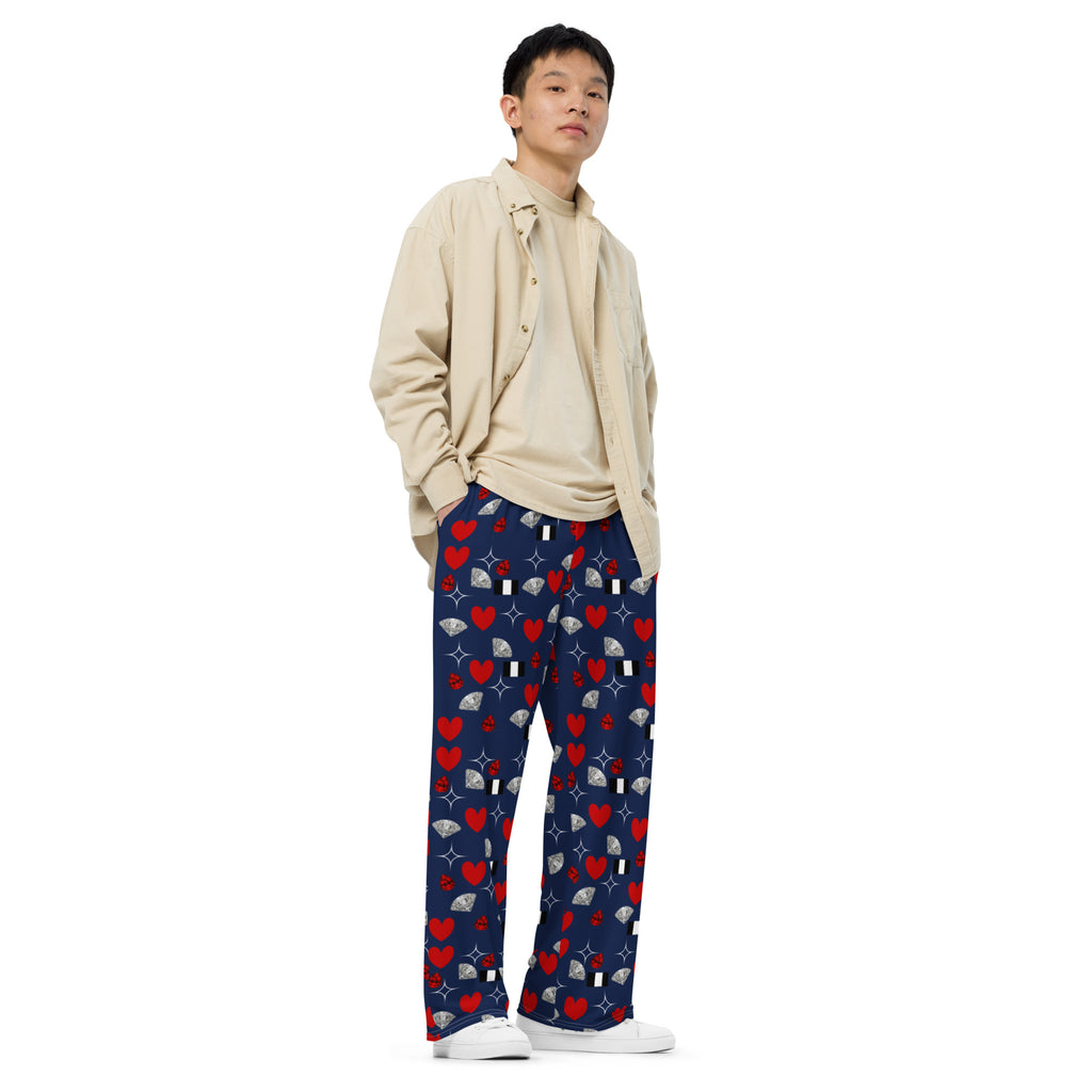 Unisex wide-leg pants by Daemon Luxury featuring all-over print design in white, shown from the front with relaxed fit.