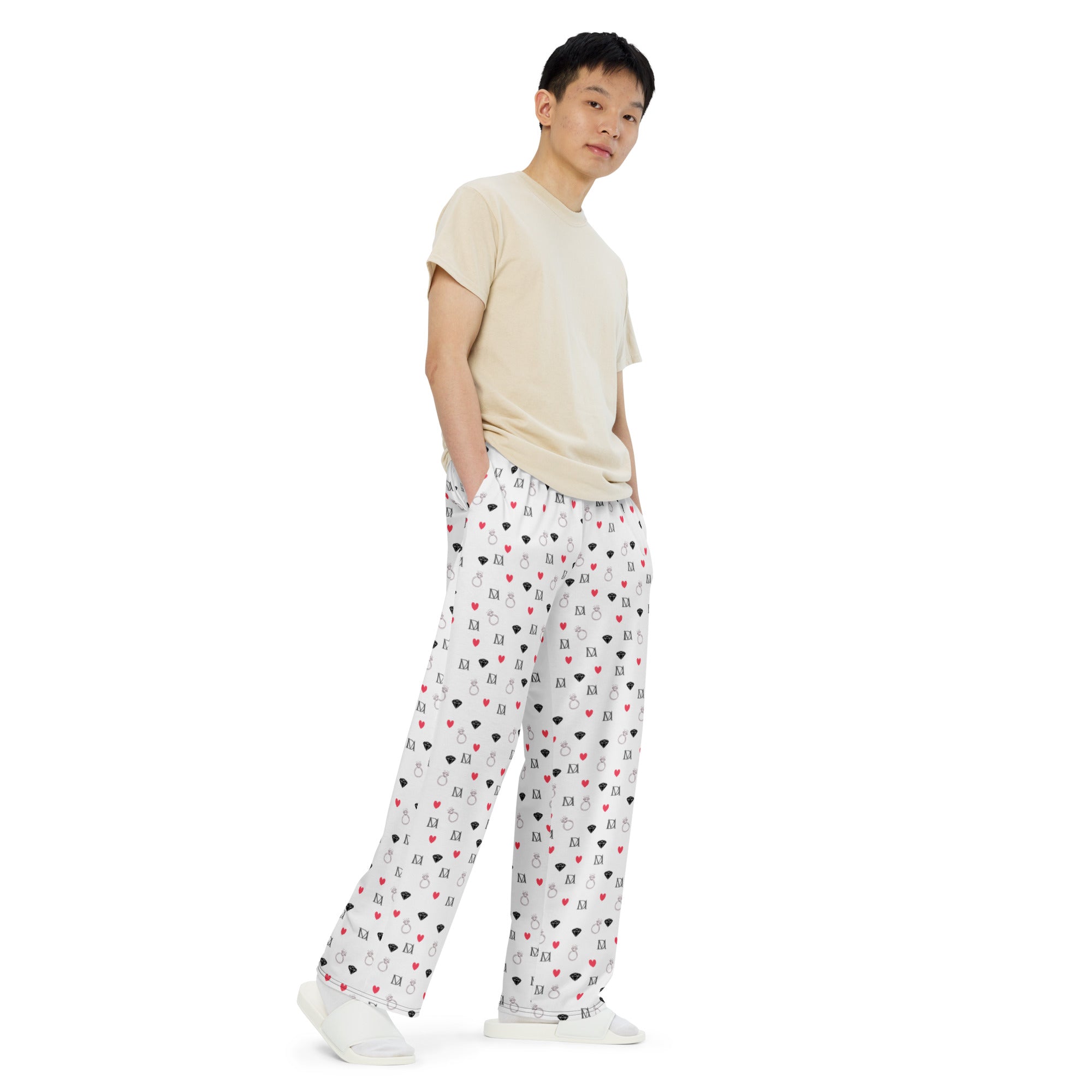 Unisex wide-leg pants by Daemon Luxury featuring speckled diamond artica blizzard print in white, displayed from the front.