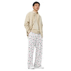 Unisex wide-leg pants featuring speckled diamond pattern in white, from Daemon Luxury's Artica Blizzard Pantaloni Sala collection.