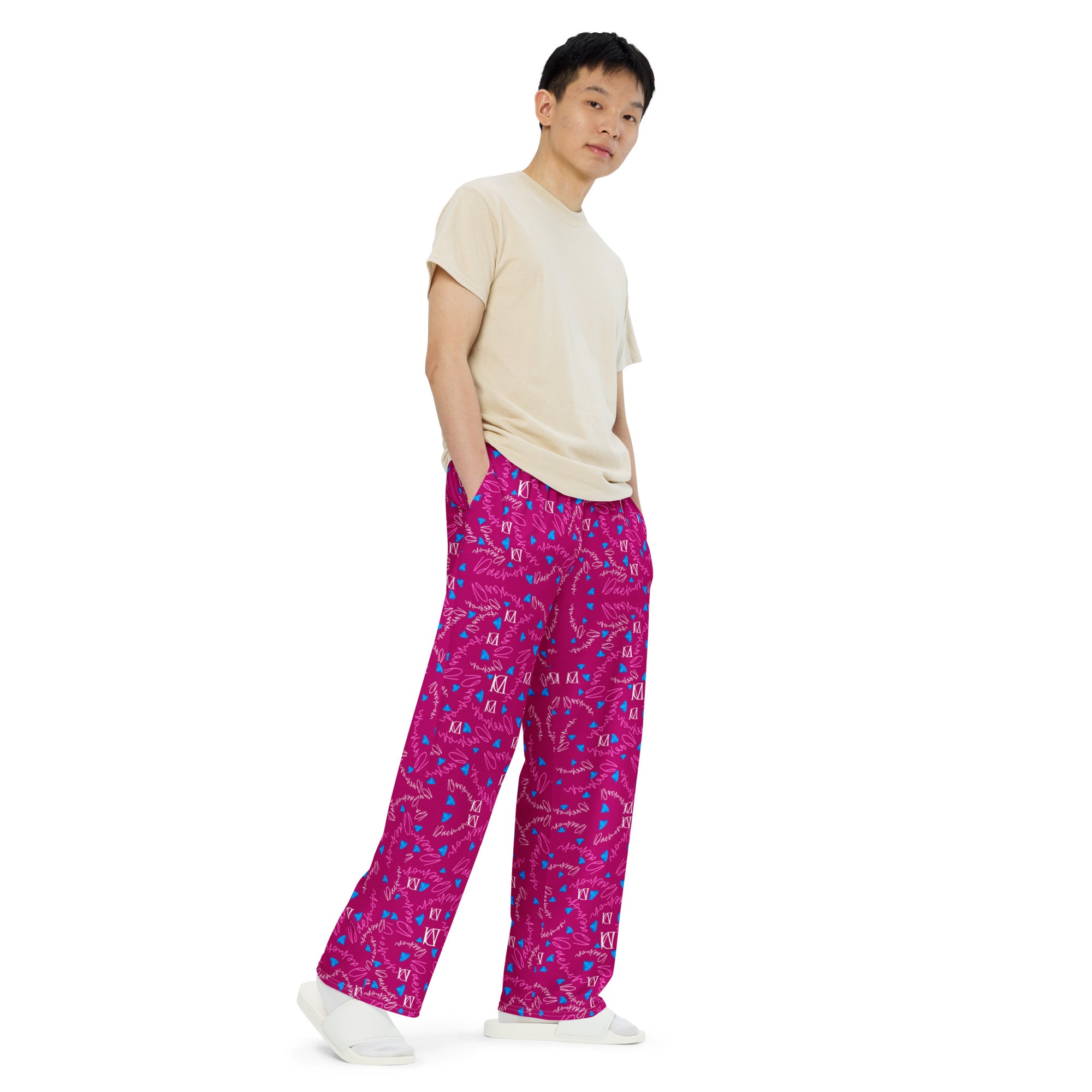 Unisex wide-leg pants from Daemon Luxury featuring an all-over Picasso Mirrors Little Magenta print, shown from the front.