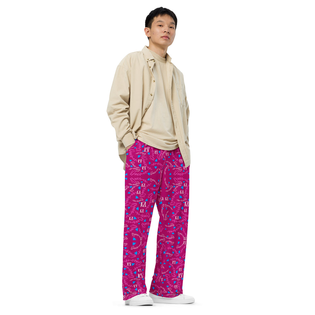 Unisex wide-leg pants with all-over Picasso Mirrors Little Magenta print from Daemon Luxury, shown from the front.