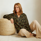 Daemon Luxury Sun Glow California women's long-sleeve pajama top with all-over print in black, made from silky satin fabric.