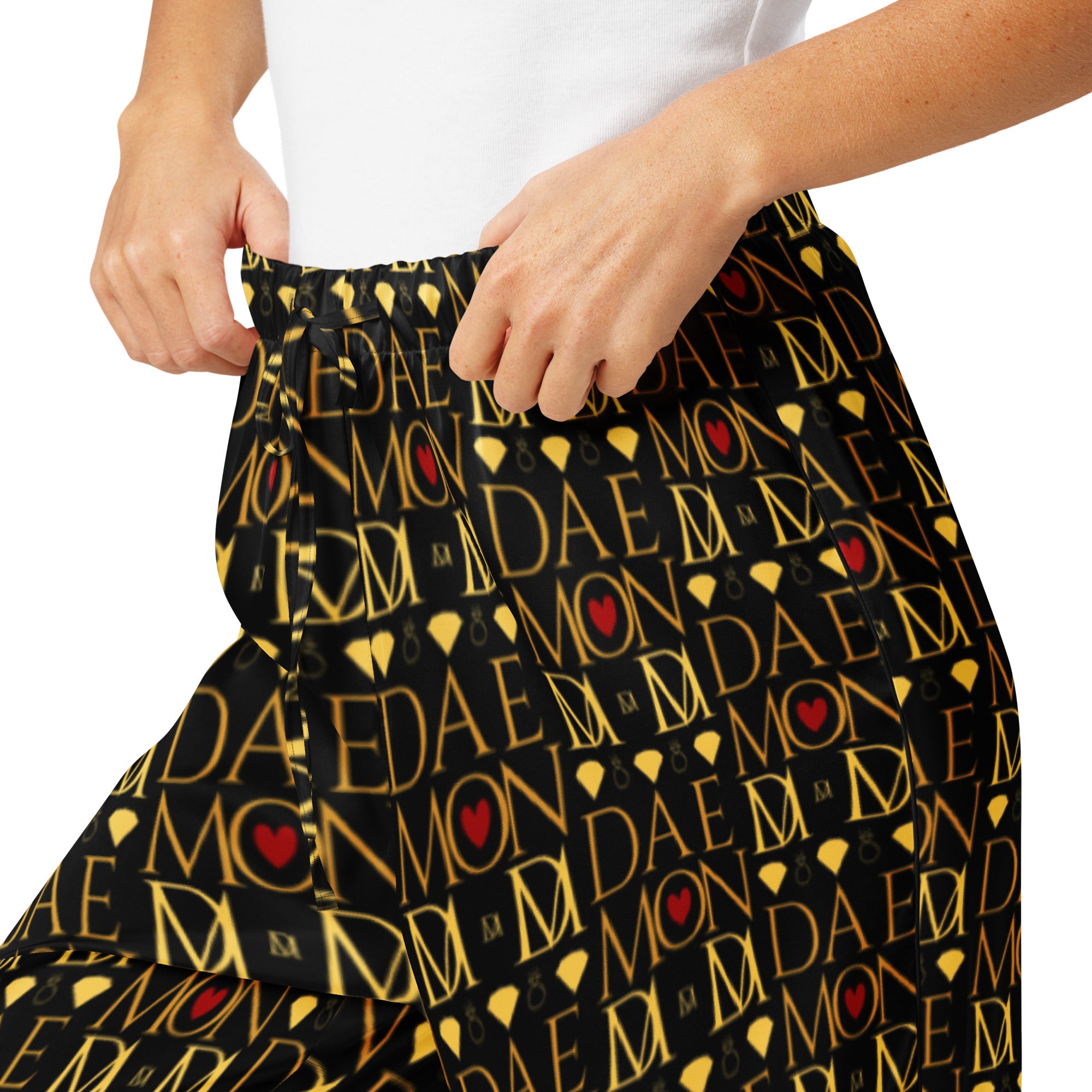 Daemon Luxury Sun Glow California women's silk pajama pants with all-over black print, soft and elegant for comfortable sleepwear.