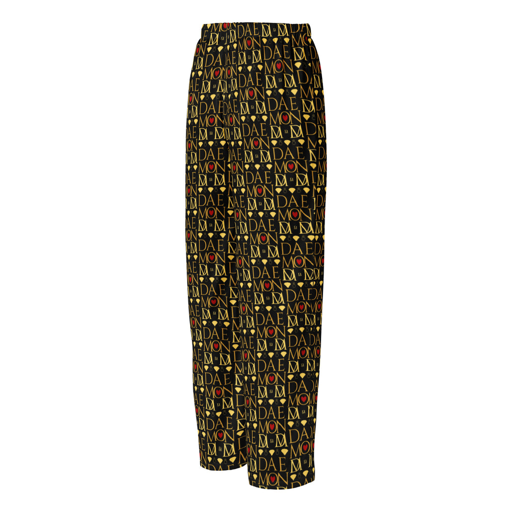 Daemon Luxury Sun Glow California women's silk pajama pants with all-over black print, shown from the back.
