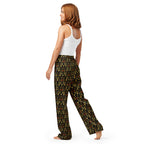 Sun Glow California women's silk pajama pants by Daemon Luxury with an all-over sunset print on white fabric.
