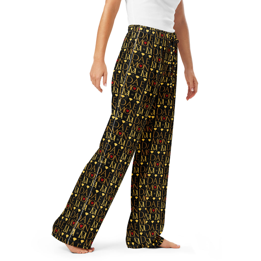 Daemon Luxury Sun Glow California women's silk pajama pants with all-over white and colorful print, front view.