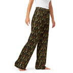Daemon Luxury Sun Glow California women's silk pajama pants with all-over white and colorful print, front view.