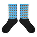 Black sublimated socks featuring honeybee and shores design from Daemon Luxury's Honeybee Shores Pacifica Fever collection.