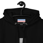 Daemon Stealth Pardon unisex black hoodie with cotton heritage fabric and drawstring hood, close-up view showing fabric texture.