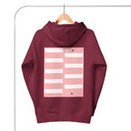 Maroon unisex luxury hoodie with "Distilled Love" logo by Daemon, featuring a cotton heritage fabric and a relaxed fit.