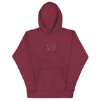 Maroon unisex luxury hooded sweatshirt by Daemon with cotton heritage fabric and stylish front design.