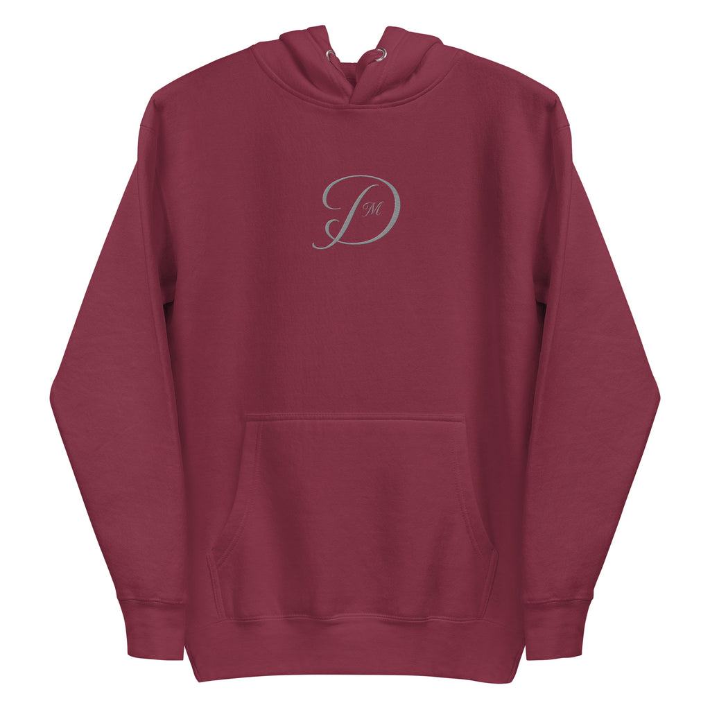 Maroon unisex luxury hoodie from Daemon's Distilled Love collection, featuring a cotton heritage fabric and front design.
