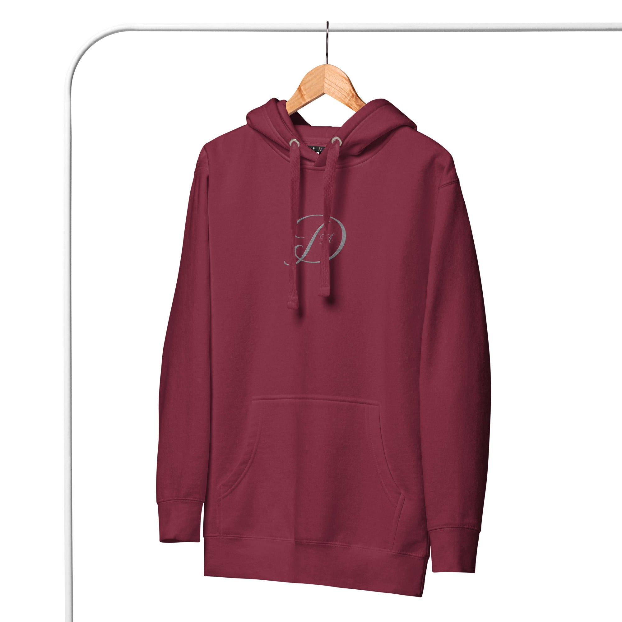 Maroon Daemon Distilled Love Luxury hoodie with front design, unisex cotton blend, casual style, and comfortable fit.