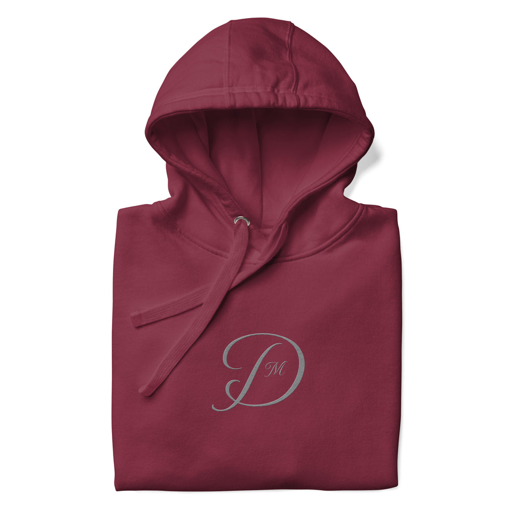 Maroon unisex luxury hoodie from Daemon's Distilled Love collection, featuring a cotton heritage fabric and a front design.