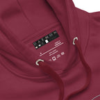 Maroon unisex luxury hoodie by Daemon featuring a cotton heritage fabric with a hood and relaxed fit.
